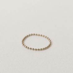 Highlights • 14K Gold Filled • 1mm Flexible Ball Chain About This Piece Our simple and minimal rings are made to suit anyone and will last a lifetime! Minimal Rings, Minimal Ring, Gold Filled Ring, Birthstone Charms, Wren, Ball Chain, Delicate Bracelet, Gold Filled, Gold Bracelet