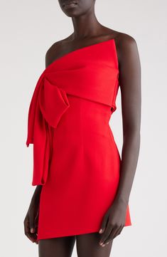 An explosive bow emphasizes the asymmetric silhouette of a striking, strapless dress cast in a vibrant vermilion hue. Hidden side-zip closure Asymmetric neck Strapless Lined 97% viscose, 3% elastane Dry clean Made in Italy Designer Clothing Bow Front Dress, Unique Formal Dress, Best Dresses For Short Women, Holiday Formal Dresses, Unique Homecoming Dresses, Fashion 2025, London Queen, Cute Formal Dresses, Red Strapless Dress