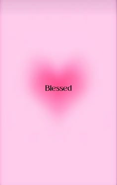 a pink heart with the word blessed written on it