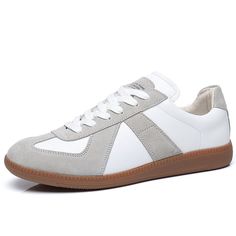 Casual Board German Training Shoes Retro Leather German Training Shoes White Sneakers With Stitched Sole, Leather Sneakers With Rubber Sole, Casual White Lace-up Shoes With Stitched Sole, Gray Leather Sneakers With Round Toe, Casual Flat Sneakers With Leather Sole, Gray Leather Sneakers, Spring Leather Closed Toe Sneakers, Spring Low-top Leather Shoes With Contrast Sole, Casual Suede Closed Toe Sneakers