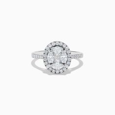 an oval shaped diamond ring set in 18k white gold