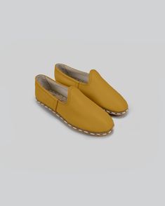 Women Leather Yemeni Shoes, Mustard Yellow Handmade Comfortable Loafer with Zero Drop, Turkish Traditional Genuine Swear Shoes Material * Upper: Vegetable Tanned Cow Leather * Lining: Vegetable Tanned Cow Leather * Insole: Vegetable Tanned Buffalo Leather (1,5mm) * Outsole:2,5MM RUBBER Product Description * Shoes handcrafted by artisans in Turkey. * Breathable natural leather prevents any bacteria that cause odor. Ideal for sockless wear. * Keeps your feet cool and dry. * Healthiest shoes in the Swear Shoes, Womens Loafers, Comfortable Loafers, Turkish Traditional, Buffalo Leather, Women Leather, Loafers For Women, Natural Leather, Mustard Yellow