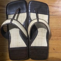 Brand New Never Worn Leather Flat Flip Flops For Beach Season, Casual Leather Flip Flops For Beach Season, Leather Sandals With Woven Sole, Summer Leather Sandals With Textured Sole, Brown Flip Flops With Textured Footbed For Vacation, Brown Textured Footbed Flip Flops For Vacation, Brown Textured Flip Flops For Vacation, Casual Brown Flip Flops For Vacation, Leather Slip-on Flip Flops For Summer