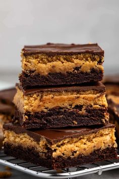 chocolate and peanut butter brownies stacked on top of each other