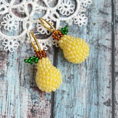 Beads earrings yellow pear fruit jewelry Beaded funny golden hoops Dangle Seed bead earrings Trendy Jewellery Christmas gift for her. 100% handmade The price shown is for ONE earring total length 3.5 cm hoops made of 925 sterling silver diameter 0.6 inch ● If you want different color or size, feel free to let me know before ordering and I will make it to order in 3-5 days. Please note that due to lighting effects, monitor's brightness, contrast and other settings, there might be some slight diff Beads Fruit, Yin Yang Charm, Trendy Jewellery, Earrings Beads, Pear Earrings, Pear Fruit, Golden Hoops, Fruit Jewelry, Earrings Trendy