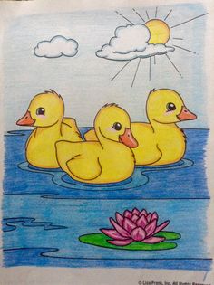 two yellow ducks floating on top of a body of water