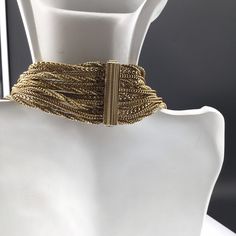 "In excellent condition Signed Christian Dior 1958 Clasp unfolds then slides out, a high quality piece that lets the necklace lay around your neckline beautifully. Clasp 1.5\" long 18.5\" shortest 7\" drape In Fabulous condition, no fading or wear, looks excellent." Formal Yellow Gold Chain Necklace With Gold Clasp, Vintage Formal Jewelry Choker, Gold-tone Necklaces With Gold Clasp For Formal Occasions, Formal Gold-tone Necklaces With Gold Clasp, Vintage Choker For Formal Occasions, Vintage Formal Choker Jewelry, Formal Gold-tone Necklace With Gold Clasp, Luxury Multi-strand Necklace For Formal Occasions, Yellow Gold Multi-strand Necklaces For Formal Occasions