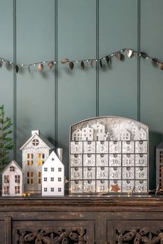 christmas decorations on top of a wooden table