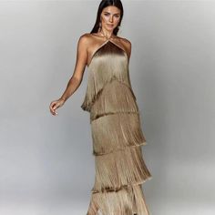 Turn heads with the Tiana Maxi Dress, a metallic, backless beauty with tassel halter neckline. Perfect for glamorous evenings. Long Fitted Dresses, Backless Evening Dress, Party Kleidung, Maxi Dress Party, Metallic Colors, Elegant Woman, Evening Dress, Women Brands, Dress Length