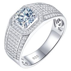 a white gold ring with diamonds on the sides and a center stone in the middle