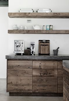 the kitchen counter is made out of wood