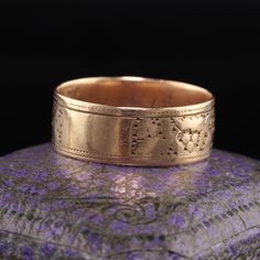 Beautiful Antique Victorian 14K Rose Gold Engraved Wide Wedding Band. This beautiful wedding band is crafted in 14K rose gold and has an interesting engraved design going around the entire ring. Item #R1190 Metal: 14K Rose Gold Weight: 2.5 Grams Size: 6 3/4 Measurements: Top of the ring measures 6.53 mm wide and band measures 6.53 mm wide. Measurements off the finger: .68 mm high Layaway: For your convenience, we will be happy to provide layaway payment options. Please contact us to work out a l Heirloom Rose Gold 14k Band, Vintage Wide Band Engraved Wedding Ring, Vintage Engraved Wide Band Wedding Ring, Vintage Engraved Wide Band Ring For Wedding, Antique Engraved Ring For Marriage, Antique Hallmarked Engraved Ring For Marriage, Rose Gold 14k Decorative Wedding Band, Antique Engraved Ring With Decorative Band For Ceremonial, Antique Engraved Ring With Decorative Band For Ceremonial Occasions