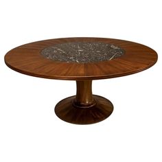 a round wooden table with marble top on an isolated white background for use as a centerpiece