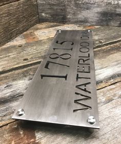 a metal sign that says waterproof on it