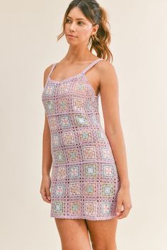 Expertly crafted with intricate floral crochet squares, the Meina Crochet Mini Dress in Lavender is the perfect swimsuit cover up for your next beach vacation. Stay cool and stylish in this sleeveless tank mini dress, perfect for the summer season. Spring Poolside Crochet Summer Top, Summer Beach Crochet Top With Spaghetti Straps, Summer Crochet Top With Spaghetti Straps For Beach, Summer Crochet Dress With Spaghetti Straps, Spring Poolside Crochet Top, Casual Purple Crochet Top For Summer, Crochet Trim Dress For Poolside Spring, Spring Crochet Dress With Crochet Trim For Poolside, Casual Purple Crochet Top For Vacation