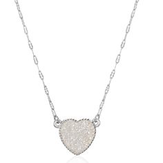 PRICES MAY VARY. STYLISH DESIGN - This delicate sparkling heart necklace features an elegant, iridescent crystal pendant that you'll never want to take off. It's perfect from day to night and will be a trendy and pretty addition to your jewelry collection. SUPERIOR QUALITY - Every detail has been fine-tuned for maximum quality, longevity, and comfort. Approx. Measurements: 16 inches with a 3 inch extender and a 15mm pendant. Silver tone plated, with glittery simulated geode textured stones that White Heart Necklace For Valentine's Day Party, Valentine's Day White Heart Necklace For Party, White Heart Pendant Necklace For Party, Iridescent Necklace, Necklaces Trendy, Sparkly Fashion, Druzy Pendant Necklace, Iridescent Crystal, Bohemian Necklace