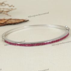 Natural Ruby Sterling Silver Bangle-Square Cut Gemstone Bangle-925 Solid Silver Bangle-July Birthstone Bangle-Handmade Bangle for Gift-Ruby Bangle-Bridesmaid Bangle-Gift for Her-Wedding Gift-Anniversary Gift ★ PRODUCT DETAILS ★ * SKU - BST-388-RB * Product - Bangle * Metal - Sterling Silver * Metal Purity - 925 * Total Weight - 12.88 GMS (Approx.) ★ STONE DETAILS ★ * Stone Name - Ruby  * Stone Weight - 3.70 CTS   * Stone Shape  -  Square * Stone Color - Red * Stone Cut  -  Faceted * Birthstone Elegant Silver Square Bracelet, Rectangular Fine Jewelry Wedding Bracelet, Square Bracelets For Gift, Square Silver Fine Jewelry, Ruby Bangles, Gemstone Bangle, Square Stone, Stone Bangle, Handmade Bangles