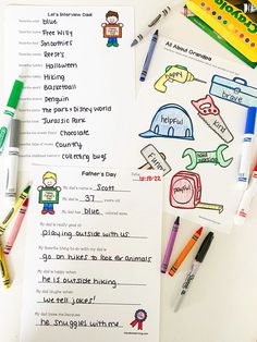 two children's worksheets with markers and pens on the table next to them