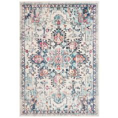 a white rug with blue, pink and orange flowers on the center is featured in this image