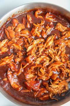 the food is being cooked in the pan on the stove top and ready to be eaten