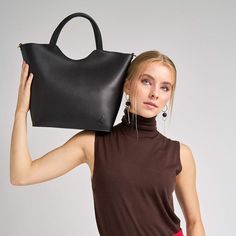 An elegant design that you can carry in a variety of settings. Made of the finest full- grain leather, The Scoop Tote fits your laptop, iPad, books, and more but is not heavy or bulky. It's a truly transitional piece! Removable Crossbody Strap Includes a lined zippered pocket plus 2 open pockets 10.5" long, 11.5" high, 4.5" wide Chic Soft Leather Laptop Bag With Double Handle, Structured Soft Leather Bag For Everyday, Structured Leather Bucket Bag, Modern Top Handle Bag, Structured Leather Satchel For Everyday Use, Minimalist Structured Shoulder Bag For Everyday, Chic Laptop Bag With Large Capacity For Daily Use, Chic Everyday Leather Laptop Bag, Chic Large Capacity Laptop Bag For Daily Use