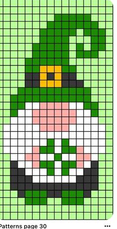 a green and white pixellated pattern with a lepreite hat