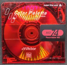 a compact disc that is red and yellow