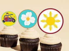 three cupcakes with white frosting on top and one decorated with an image of a car