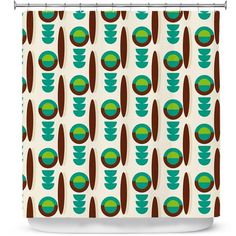 a shower curtain with green and brown circles on it