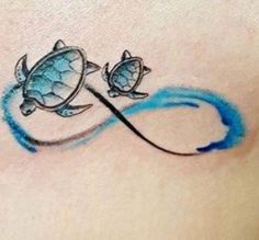 a tattoo with two turtles on top of each other and an infinite sign in the middle