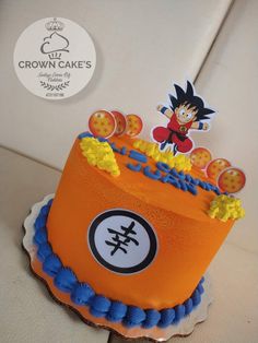 a dragon ball themed birthday cake is on display for the guests to see it's age