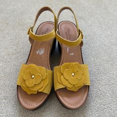 Shop melissaleigh730's closet or find the perfect look from millions of stylists. Fast shipping and buyer protection. Mariella Yellow Suede Floral Wedge Sandals NWT 9.5 Never worn Made in Italy Leather upper Man made some Yellow flower Beach Wedge Sandals With Heel Strap And Low Heel, Yellow Wedge Heel Sandals With Heel Strap, Floral Wedges, Yellow Flower, Yellow Flowers, Wedge Sandals, Leather Upper, Wedges, In Italy