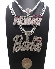 NICKI MINAJ BARBIE & PINK FRIDAY PENDANT AND CHAINS BARBIE PENDANT SIZE: 2.85" WIDE X 1.65" TALL W/ 9mm 20" CUBAN CHAIN PINK FRIDAY PENDANT SIZE: 2.65" WIDE X 1.65" TALL W/ 4mm 18" FRANCO CHAIN IF YOU WANT A DIFFERENT LENGTH CHAIN PLEASE SEND A MESSAGE I ONLY SHIP TO PAYPAL CONFIRMED ADDRESSES PAYMENT IS DUE IMMEDIATELY AT AUCTIONS END AND MUST BE PAID VIA PAYPAL We Ship with USPS Q: What countries do you ship to? A: We ship inside the United States and EU countries Q: Do you ship to Alaska PR and Hawaii? A: Yes Q: Do you ship to APO/FPO and Post Office box addresses? A: Yes Q: How do you ship your packages? A: All orders are shipped via USPS. Tracking information will be emailed to you once it is generated Q: How long does it take for an item to ship? A: Items ship within 1-2 business day Barbie Pendant, Nicki Barbie, Cuban Chains, Nicki Minaj Barbie, Pink Friday, Eu Countries, Cuban Chain, Nicki Minaj, Accessories Necklace