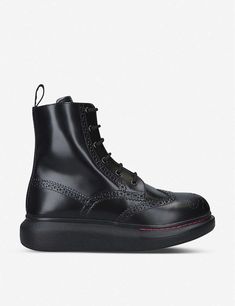 With a passion for merging luxury with rebellious style, it’s not the first time (nor will it be the last) that we see Alexander McQueen fuse opposing influences. The perforations of these Hybrid ankle boots are a blatant nod to humble brogues, but the shape, supple leather, and thick soles are borrowed from combat styles for an unexpected combo. Don yours to toughen up floral dresses. Mcqueen Shoes, Womens Designer Boots, Contrasting Stitching, Alexander Mcqueen Shoes, Suede Trainers, Leather Trainers, Floral Dresses, Designer Boots