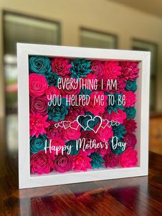 a mothers day card with flowers in the shape of hearts and words that say, everything i am you help me to be happy mother's day