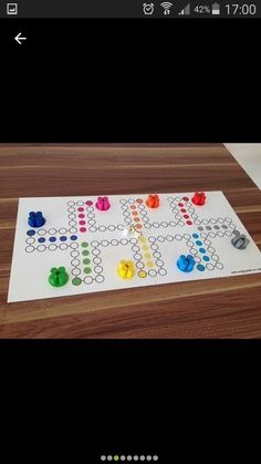 a board game sitting on top of a wooden table