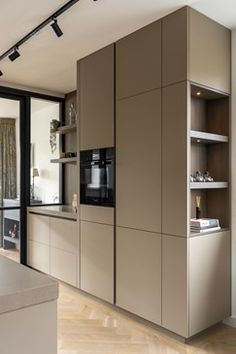 the kitchen is clean and ready to be used as a living room or dining area