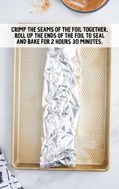 an image of some food that is on a baking sheet with the words crimp the seams of the foil together, roll up the ends of the foil to seal and bake for 2 hours 30 minutes