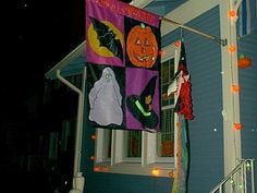 a house decorated with halloween decorations and lights