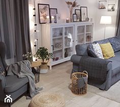 a living room filled with furniture and decor