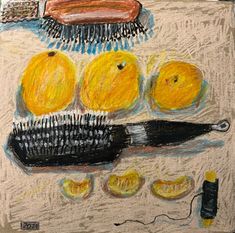 a drawing of oranges and a brush on a table