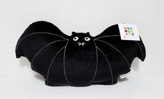 Spruce up your Halloween couch, chair or room with this large velvet fish bat pillow. Holiday theme, contrast stitching, bat shaped, velvet finish. 22in W x 12in L Polyester, fill Spot clean . Bat Pillow, Black Pillow, Black Pillows, Halloween Bat, Holiday Theme, Garden Pillows, Couch Chair, Halloween Items, Viral Tiktok