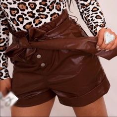 **New! Never Worn! No Tags, No Price Tags, No Flaws!** -Brand: White Birch -Size: Large-(Oversized) -Color: Brown -Style: Faux Leather Shorts W/ Adjustable Belt -Material: 50% Poly Urethane 47% Polyester 3% Spandex -Accents: Button Closure -Inseam: 5 Inches , Waist: 18 Inches Flat , Rise: 15-16 Inch Casual Faux Leather Shorts For Fall, Casual High Waist Leather Shorts, Fall Leather Shorts With Belt Loops, Leather Shorts With Belt Loops For Fall, Leather High-waisted Shorts For Fall, Trendy Leather Shorts For Fall, Chic Brown Shorts For Fall, Brown Faux Leather Bottoms With Belt Loops, Trendy Fall Shorts For Going Out