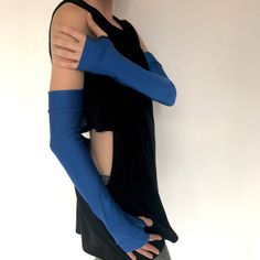 "TRIXY XCHANGE :: Fashion For The Fearless Hand made in the USA by me! :) Find more of my arm warmers, fingerless gloves, and clothing at www.TrixyXchange.com A B O U T. Long Royal Blue Gloves Halloween Dr. Who Costume Arm Warmers Shiny Elbow Length HANDMADE! Long shiny royal blue arm warmers with thumb holes. Great for Halloween and cosplay costumes! :) 82% Nylon. 18% Spandex. Length: 18\" Width: 8\" - Stretches to 12\" AW18-BLUE Customize the color and length of your gloves at www.TrixyXchange Blue Arm Warmers, Dr Who Costume, Who Costume, Fur Leg Warmers, Arm Wear, Womens Cosplay, Costume Gloves, Blue Costumes, Blue Gloves