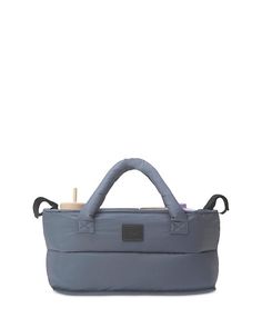 the baby changing bag in grey with handles and straps, on a white background is shown