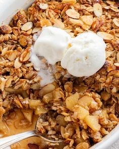 a bowl filled with granola and ice cream