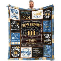 an old man is holding up a birthday blanket with his name and age on it