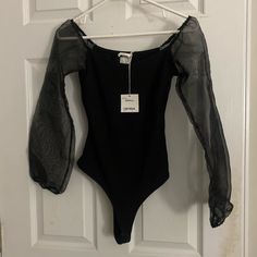 Size Extra Small Body Suit. Boutique Brand. Non-stretch Black Chic Bodysuit, Fitted Black Bodysuit For Fall, Trendy Black Bodysuit For Fall, Black Fitted Bodysuit With Sheer Sleeves, Fitted Black Bodysuit With Sheer Sleeves, Black Bodysuit For Party In Fall, Black Bodysuit For Fall Party, Black Bodysuit For Party Occasions In Fall, Black Party Bodysuit For Fall