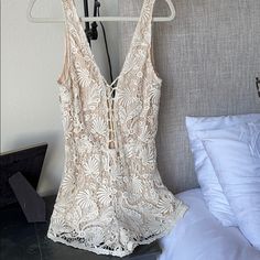 Winston White White/Cream Lace Romper Size Small - Runs True To Size Lattice Lace Up Front With Tie V Cut Front And Back Absolutely Stunning. Perfect For Wedding, Bridal Shower, Bride, Bachelorette Party Never Worn. Brand New Condition. Comes From A Smoke Free & Pet Free Home. Chic Lace Jumpsuits And Rompers For Summer, Summer Lace Jumpsuits And Rompers With V-neck, Summer Lace Jumpsuits With V-neck, Summer Party Cream Jumpsuits And Rompers, Cream Jumpsuits And Rompers For Spring Party, Fitted Cream Jumpsuits And Rompers For Summer, Spring Cream Party Jumpsuits And Rompers, Fitted Cream Jumpsuits And Rompers For Beach, Fitted Cream Jumpsuit For The Beach