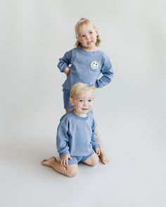 A whole vibe! This two-piece oversized set is made of oh-so-soft cotton and perfect for daily lounging! Stylish enough for a day out, and comfortable for play. Gender neutral and up to 9Y, this sweet and simple design will be your little one's favorite must-have! Oversize fit, size down if you're in between sizes. 95% cotton 5% spandex. Wash in cold water, tumble dry low. Light Blue Casual Sets For Playtime, Casual Light Blue Sets For Playtime, Light Blue Casual Playtime Sets, Casual Light Blue Playtime Set, Blue Matching Loungewear Sets, Cute Light Blue Loungewear Sets, Playful Organic Cotton Sleepwear For Loungewear, Oversized Blue Casual Sleepwear, Playful Relaxed Fit Loungewear Sets